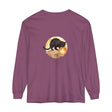 A black cat sits under a crescent moon on a night sky t-shirt