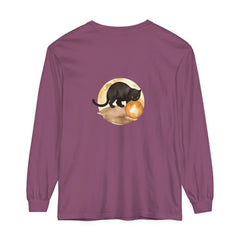 A black cat sits under a crescent moon on a night sky t-shirt