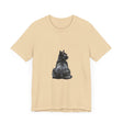 A close-up image of a black t-shirt with a mystical black cat design, featuring intricate details and vibrant colors