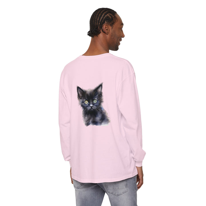 A close-up image of a mystical kitten design on a unisex long sleeve t-shirt in black, featuring intricate details and vibrant colors