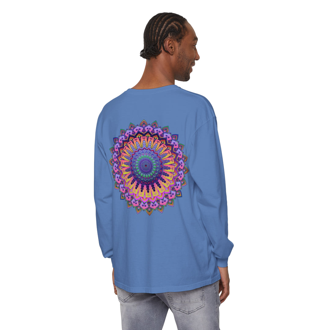 A detailed and vibrant mandala design adorns this comfortable unisex long sleeve t-shirt