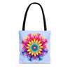 A vibrant and colorful mandala tote bag with a rainbow pattern