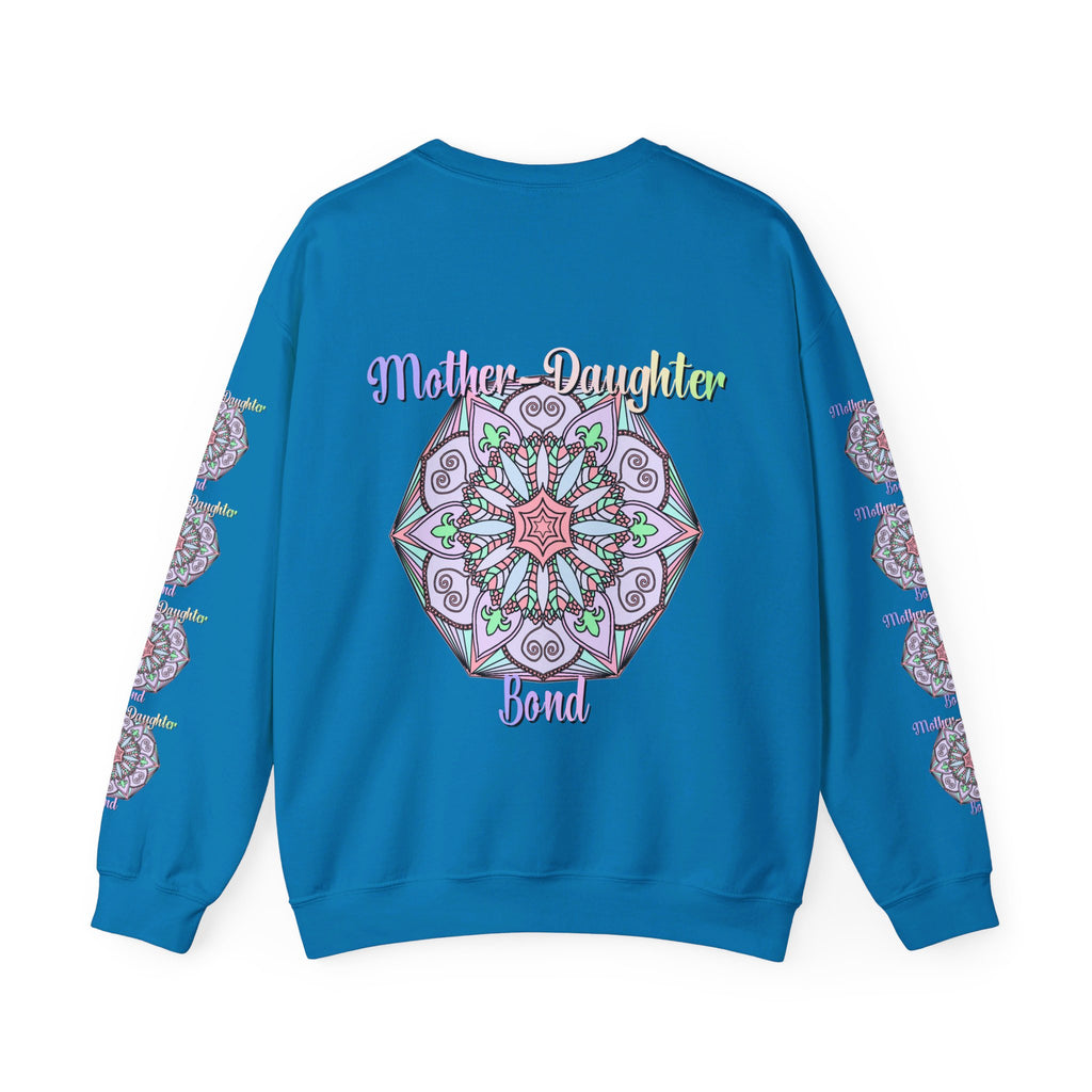 Close-up of a black unisex heavy blend crewneck sweatshirt with the words 'Mother-Daughter Bond' in white cursive font, the perfect birthday gift for mom