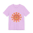 Colorful and vibrant mandala tee featuring a beautiful blend of pink, yellow, orange, and green hues