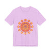 Colorful and vibrant mandala tee featuring a beautiful blend of pink, yellow, orange, and green hues