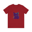 A close-up photo of a black cat mystery watercolor t-shirt with vibrant colors and intricate design on soft, high-quality fabric