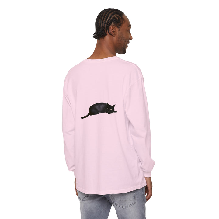 A cozy black cat sleeping peacefully on a unisex long sleeve t-shirt