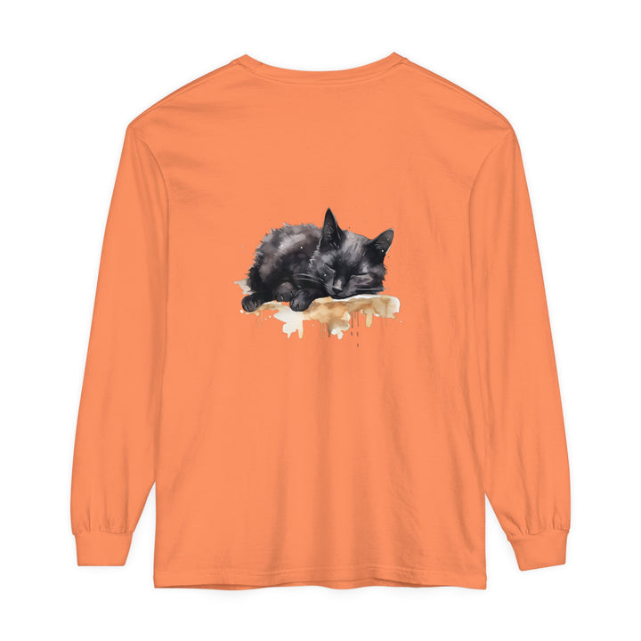 A watercolor painting of a cute black cat sleeping on a t-shirt