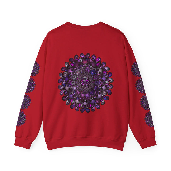 A close-up image of a Unisex Heavy Blend™ Crewneck Sweatshirt with a vibrant purple mandala design on the front, perfect for adding a pop of color and style to any outfit