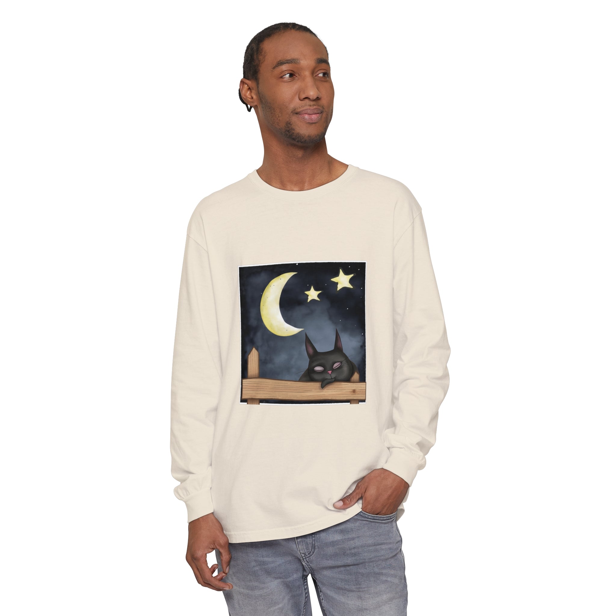 A black t-shirt with a sleepy cat gazing at the night sky design