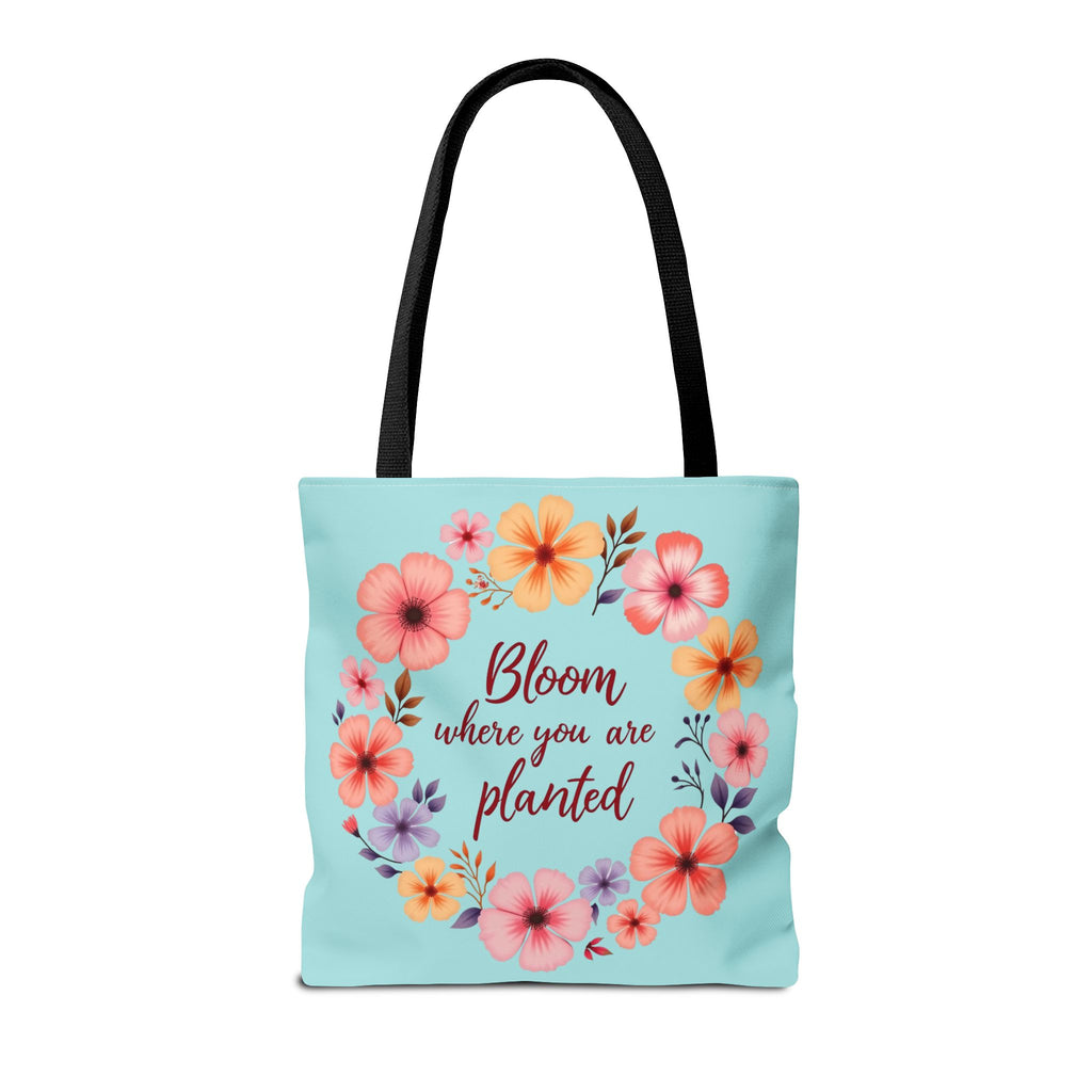 Floral tote bag in three sizes featuring the phrase Bloom Where You Are Planted with colorful flowers and leaves design