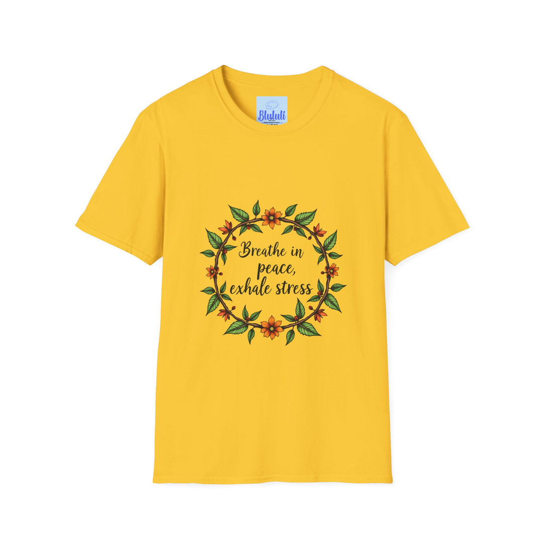 A close-up image of a white t-shirt with a colorful floral garland design and the text Breathe in Peace Exhale Stress printed in a cursive font