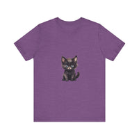 Adorable grey and white kitten with beautiful blue eyes on a soft, comfortable t-shirt