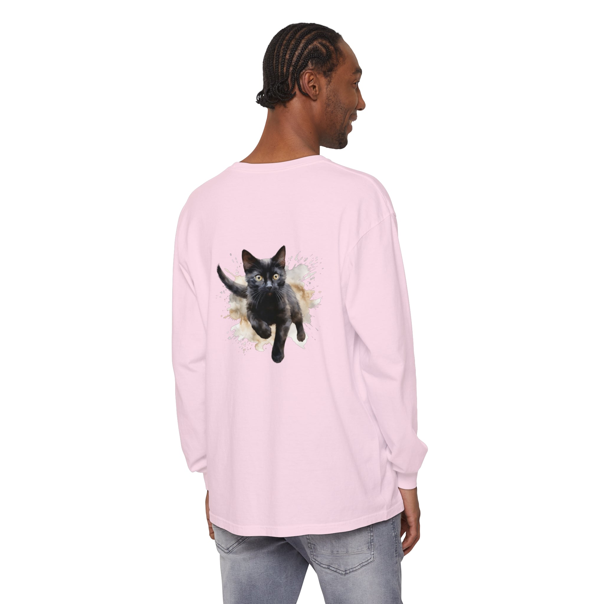 A black cat with vibrant watercolor splashes on a t-shirt