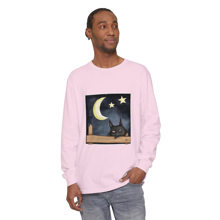 A comfortable black t-shirt featuring a sleepy cat under a starry night sky