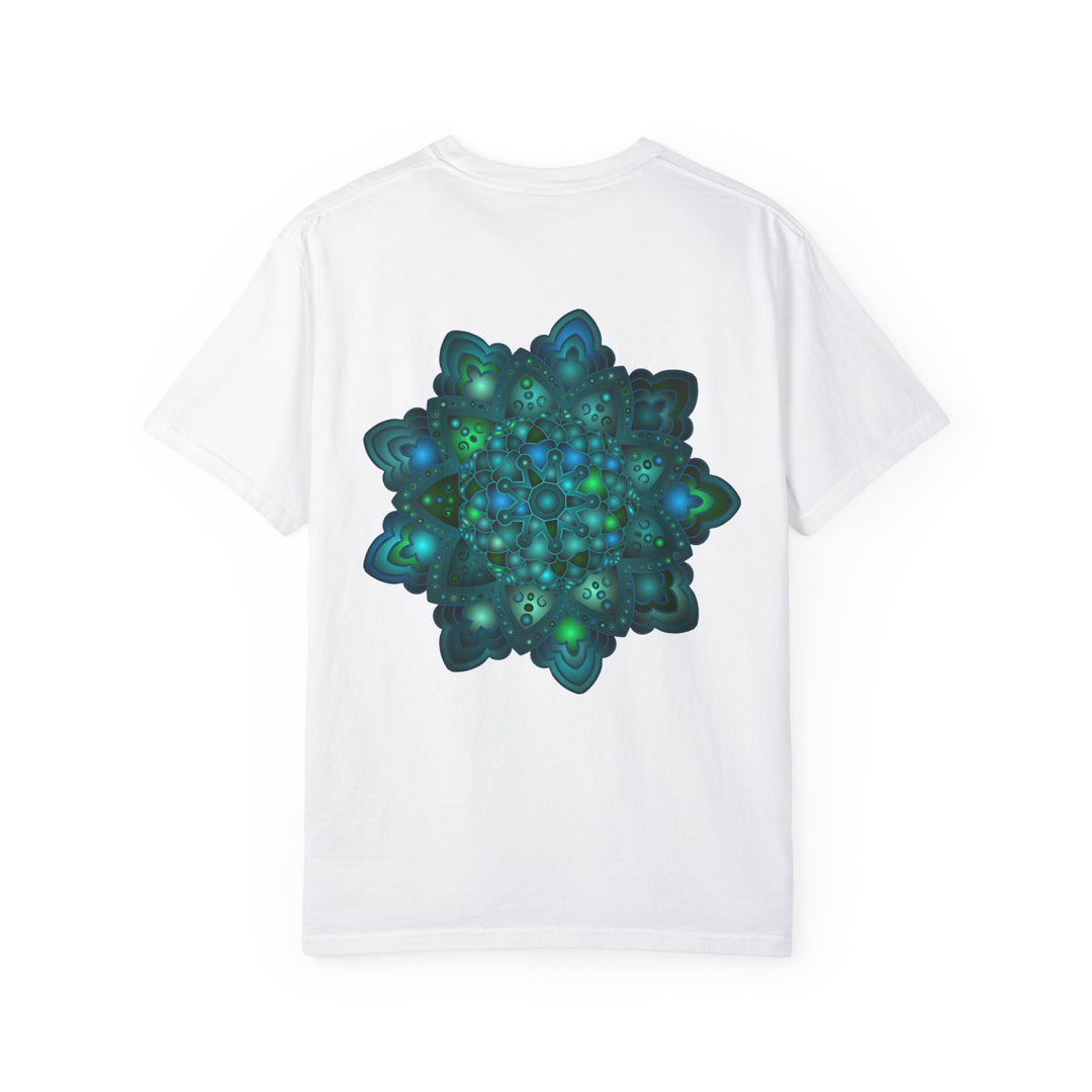 A close-up photo of a unisex blue and green mandala design t-shirt with intricate patterns and vibrant colors