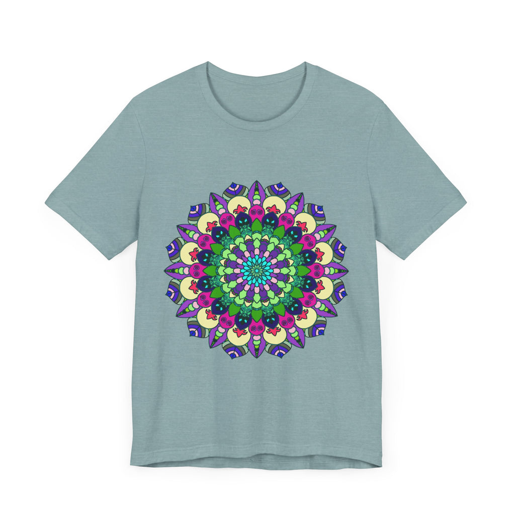 A close-up image of a vibrant mandala tee featuring a colorful and intricate design with bold patterns and beautiful details in various shades of red, blue, yellow, and green