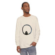 A close-up image of a black long sleeve unisex T-shirt with a mesmerizing sphere design