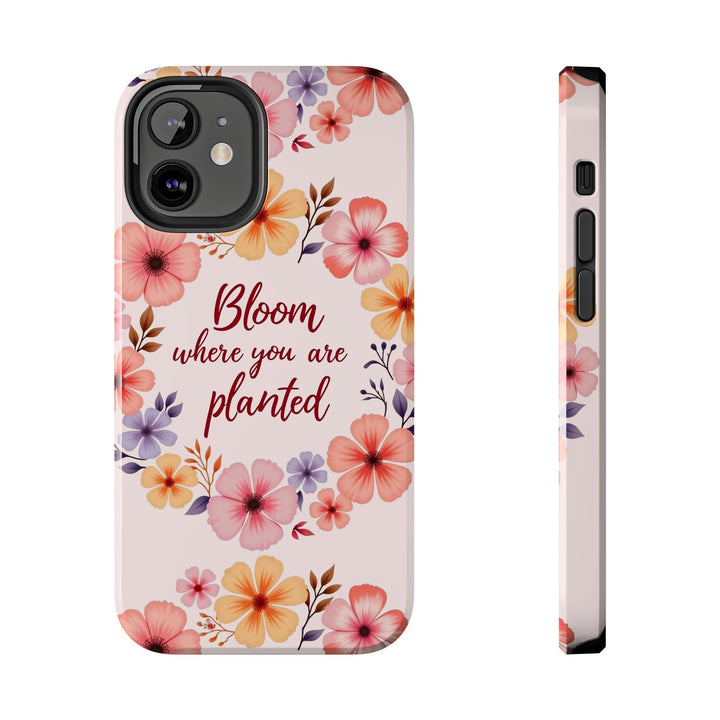 A light pink phone case with a beautiful flower garland design