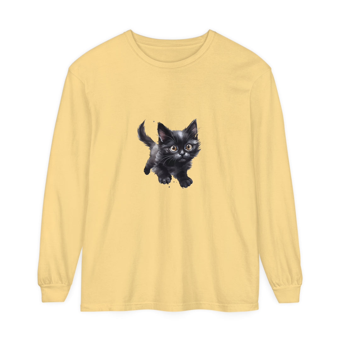 A colorful watercolor illustration of a playful kitten on a t-shirt