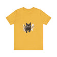 A close-up image of a black cat watercolor print t-shirt, featuring vibrant and detailed artwork of a cat in various shades of black, gray, and white with colorful splashes of watercolor paint