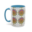 Colorful and eye-catching mandala design featured on a grey ceramic mug