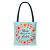 Three sizes of floral tote bags with the inspirational quote 'Bloom Where You Are Planted' printed on them, perfect for carrying all your essentials in style