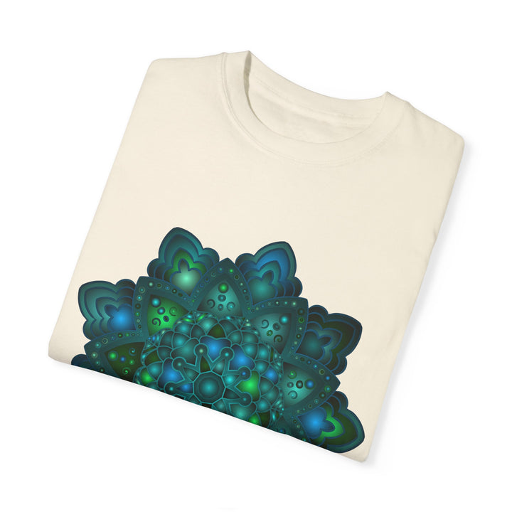 Intricate blue and green mandala design featured on unisex t-shirt