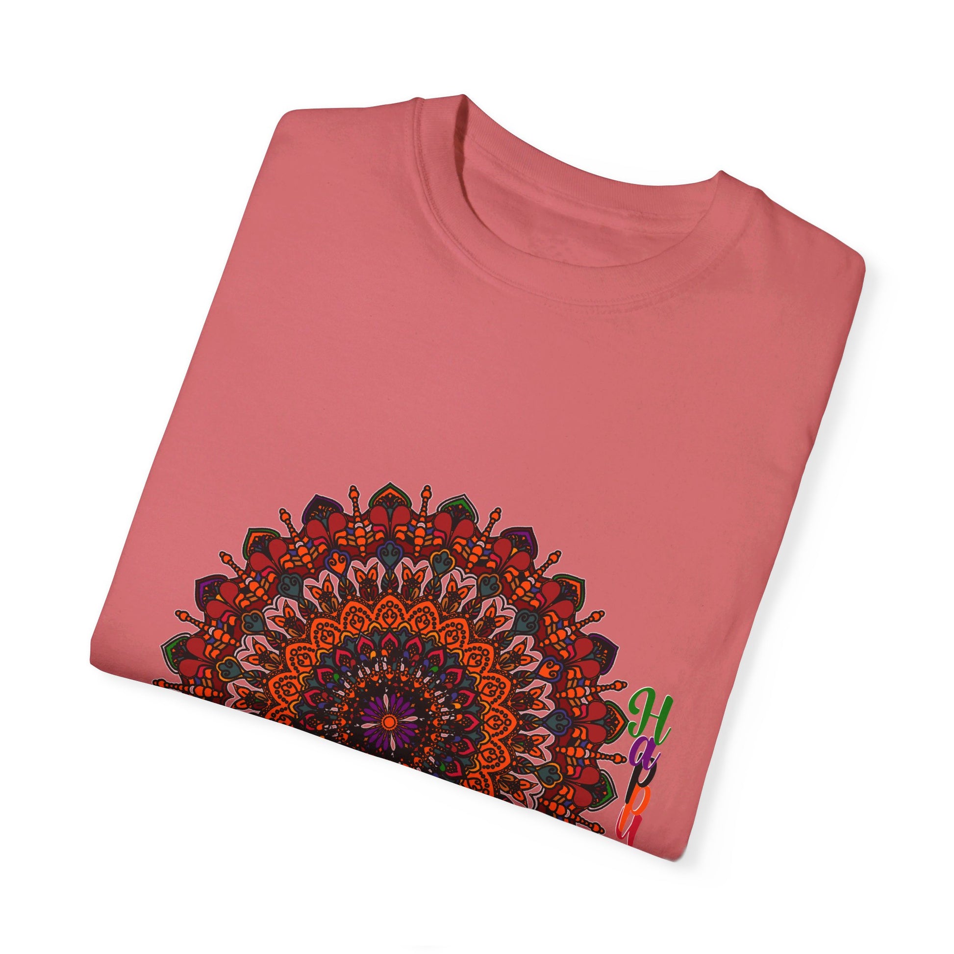 A close-up image of a unisex Halloween Mandala T-shirt, featuring handmade pumpkin mandala art on a garment-dyed tee