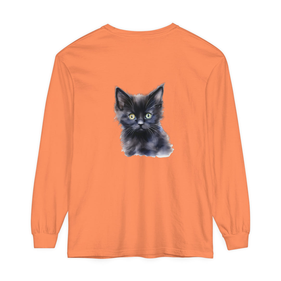 A close-up image of a mystical kitten surrounded by stars on a unisex long sleeve t-shirt in black, perfect for cat lovers and fans of whimsical fashion