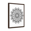 Beautiful handcrafted mandala art in black and white, displayed on gallery canvas wraps in a vertical frame