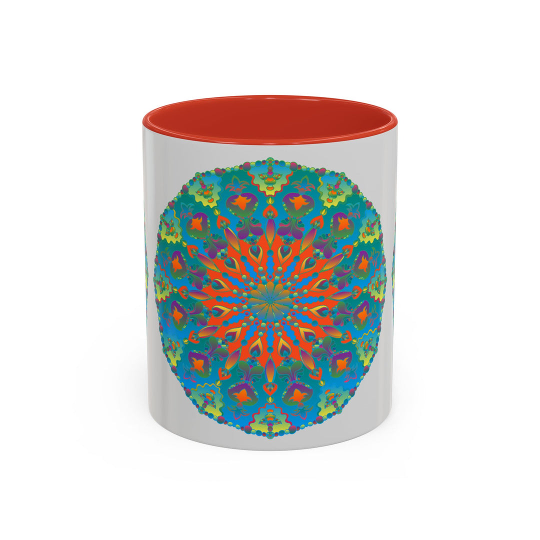 Beautiful ceramic mug featuring a detailed mandala art design in shades of blue and green