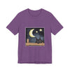 Sleepy Cat Moonlit Night T-Shirt: A cozy black graphic tee featuring a cute cat resting under the moonlight