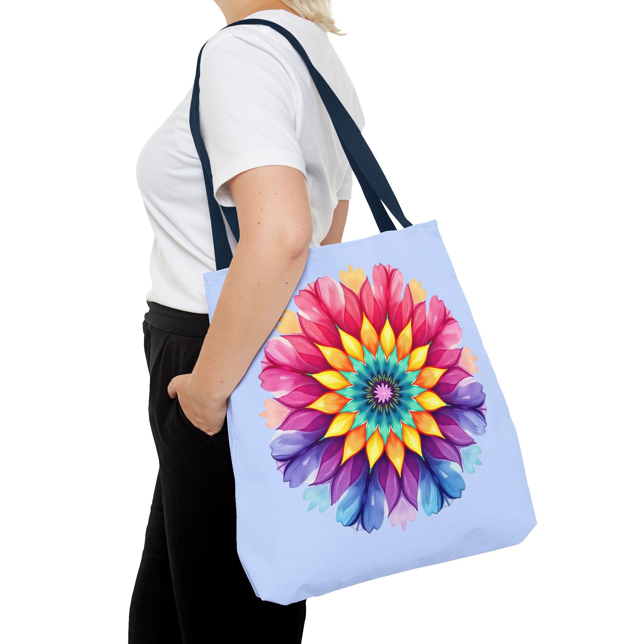 Colorful rainbow mandala design handcrafted on spacious tote bag for carrying essentials in style