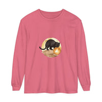 A spooky black cat stands in front of a bright full moon, printed on a soft and comfortable night sky-themed t-shirt