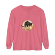 A spooky black cat stands in front of a bright full moon, printed on a soft and comfortable night sky-themed t-shirt