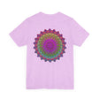 A close-up image of a vibrant mandala tee featuring intricate spiritual symbols, promoting peace and harmony through its colorful and detailed design