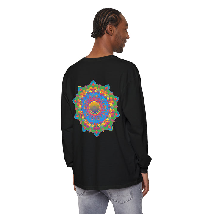 A close-up image of an intricate mandala design on a long sleeve t-shirt