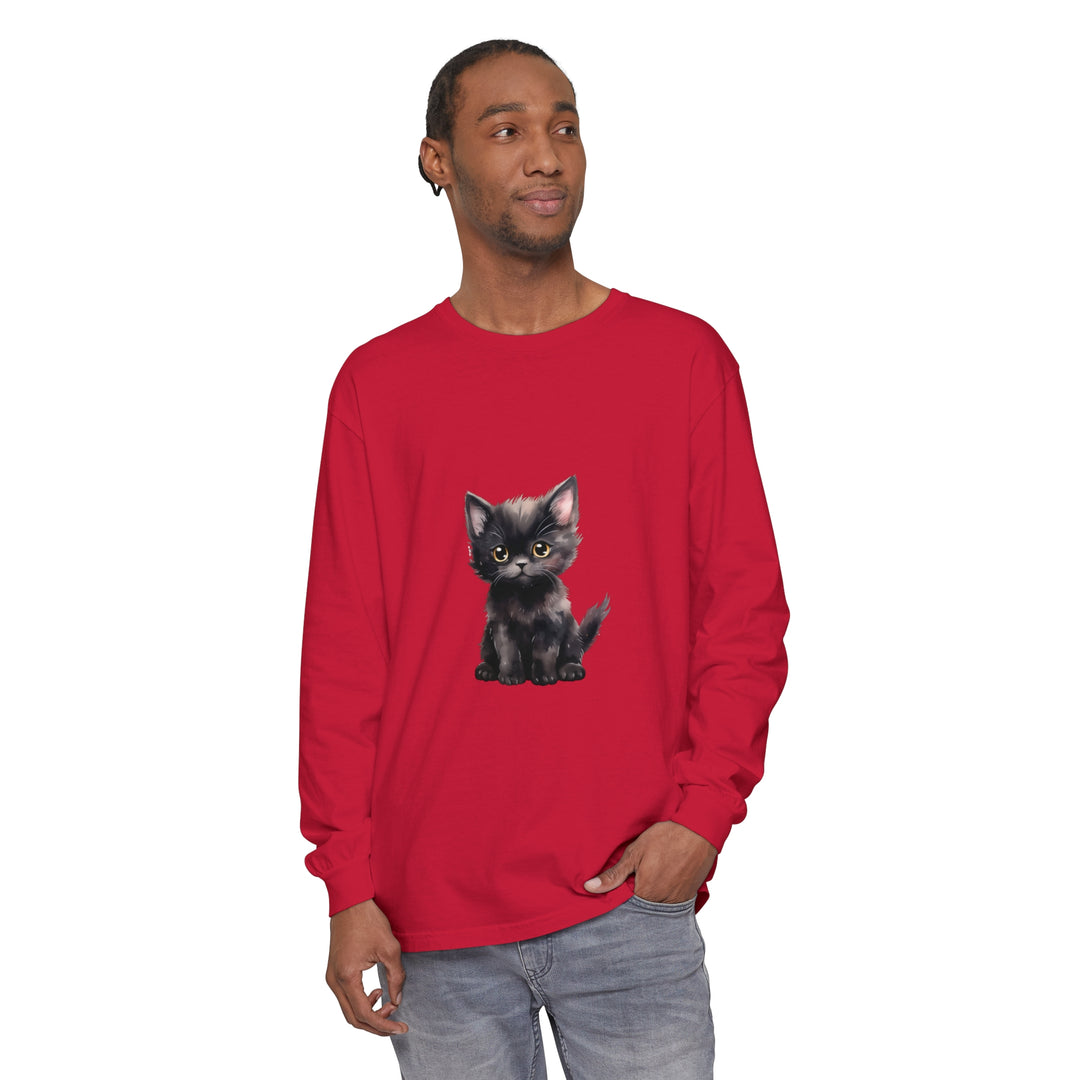 A cute black kitten with striking yellow eyes wearing a long sleeve t-shirt