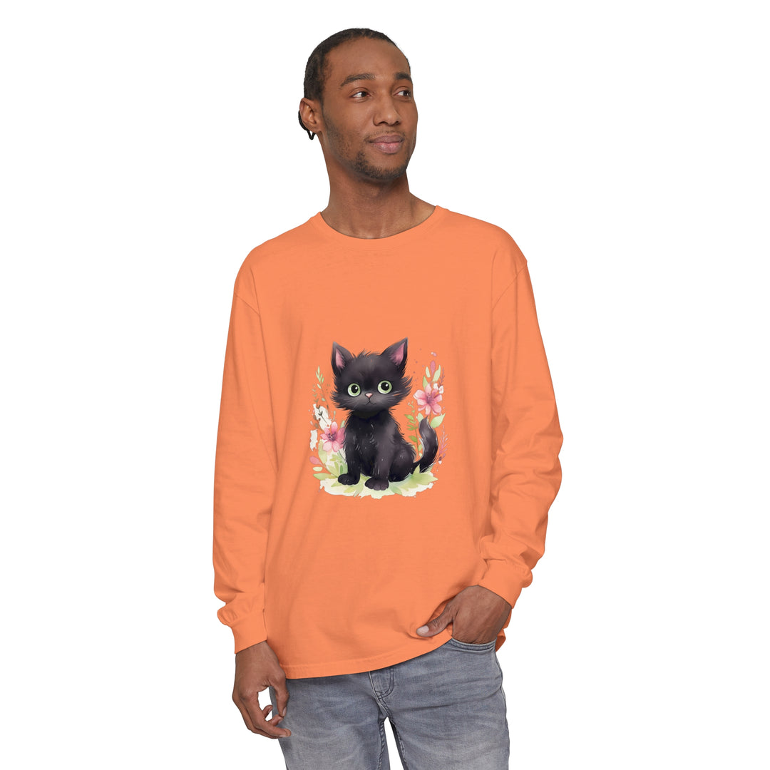 A colorful and whimsical watercolor t-shirt featuring a playful kitten surrounded by vibrant floral designs