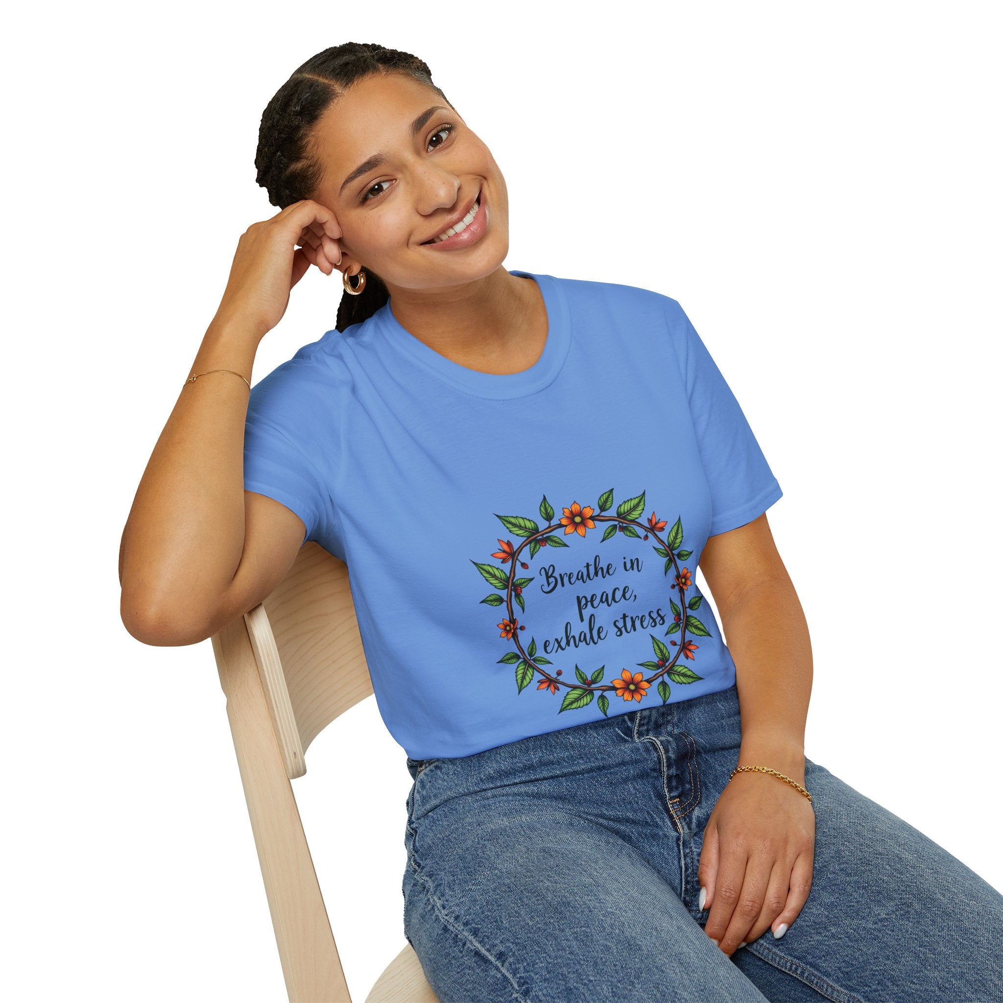 Beautiful white t-shirt with a floral garland design and the text 'Breathe in Peace Exhale Stress', perfect for promoting relaxation and tranquility