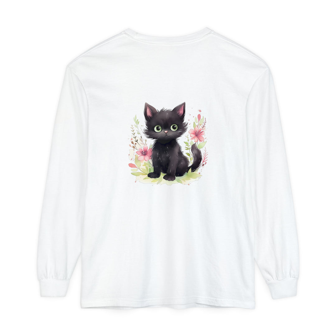 Adorable white kitten with playful expression surrounded by vibrant watercolor flowers on a t-shirt