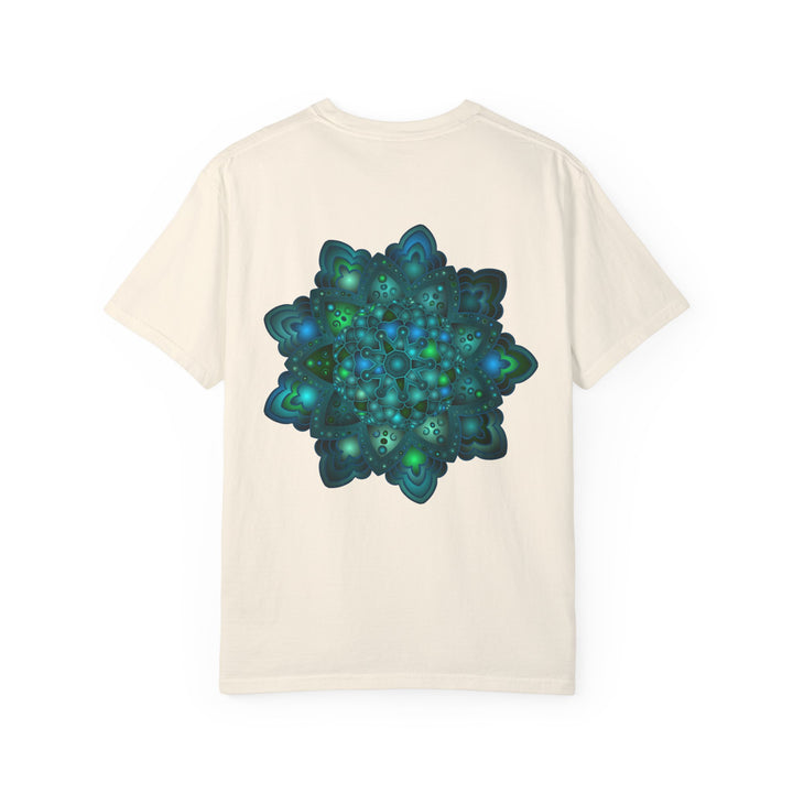 A close-up image of a unisex t-shirt featuring an intricate blue and green mandala design, perfect for casual wear and adding a pop of color to any outfit