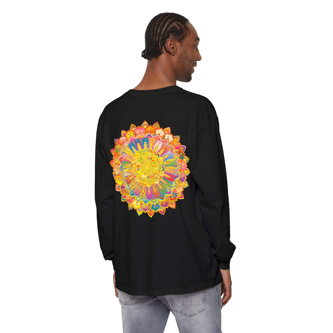 A detailed and vibrant mandala design adorns this comfortable unisex long sleeve t-shirt