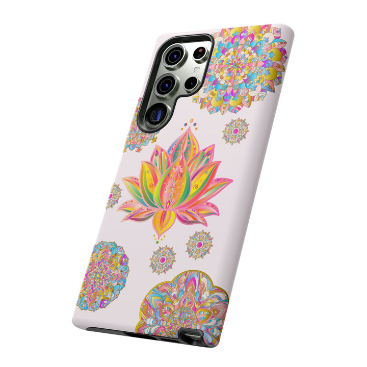 A light pink phone case featuring a delicate mandala design with a lotus flower