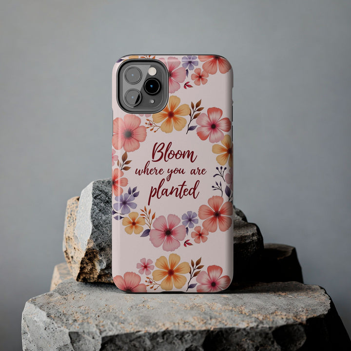 Light pink phone case with a beautiful flower garland design, perfect for adding a touch of nature and elegance to your device