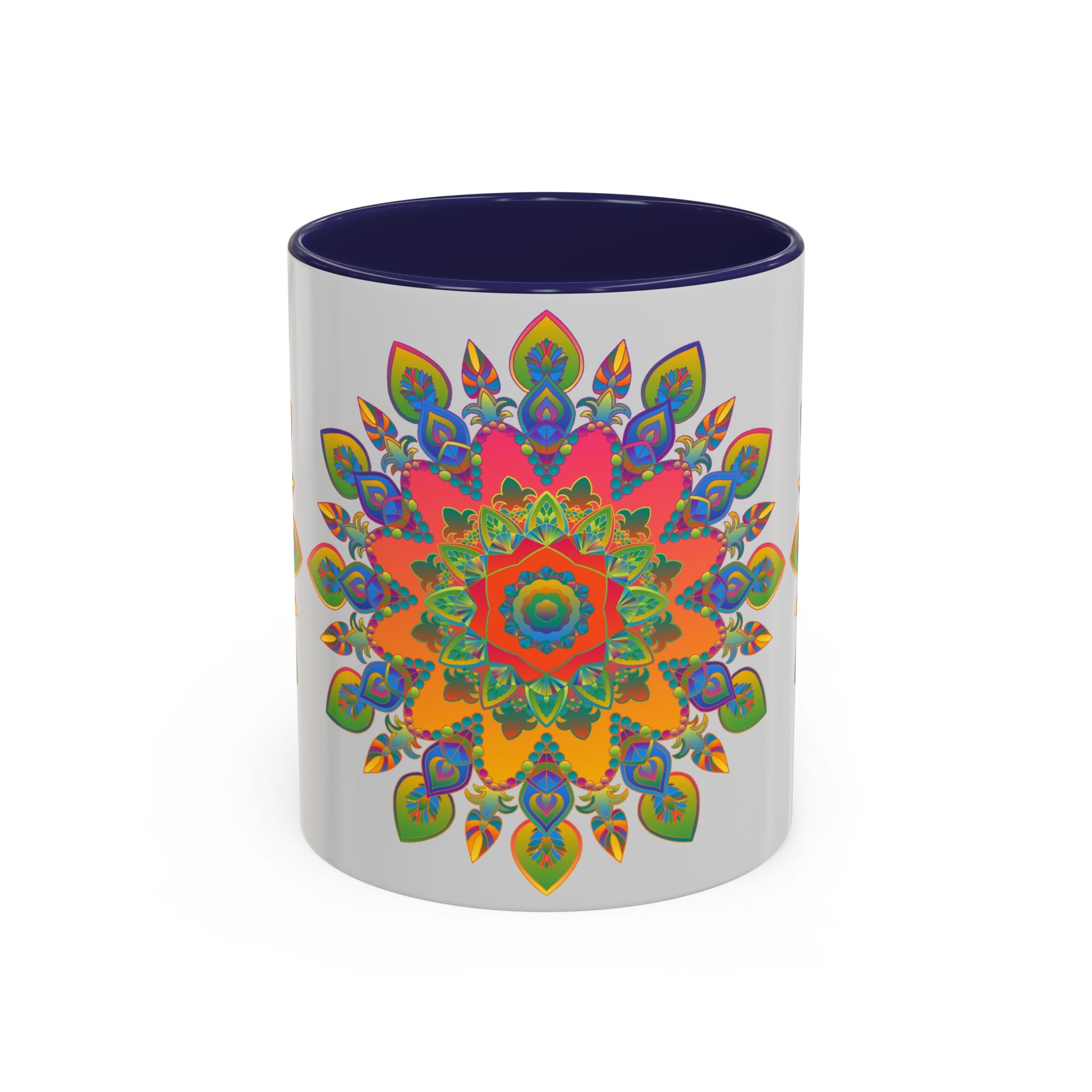 A beautiful and intricate mandala design in various colors adorns a grey coffee mug