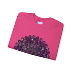 A cozy, versatile Unisex Heavy Blend™ crewneck sweatshirt featuring a vibrant purple mandala design