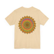A close-up image of a vibrant mandala tee, featuring intricate geometric patterns and colors that symbolize spiritual peace and harmony