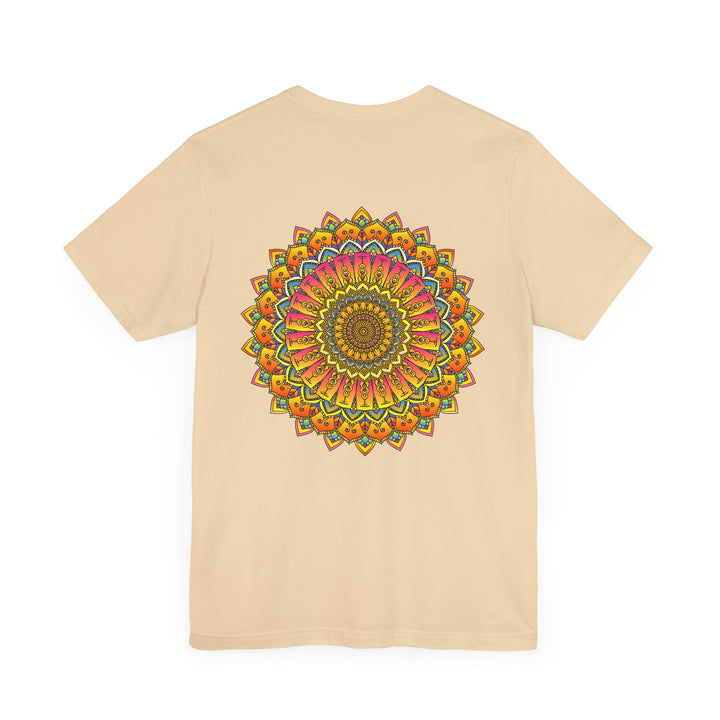 A close-up image of a vibrant mandala tee, featuring intricate geometric patterns and colors that symbolize spiritual peace and harmony